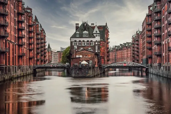 The brick warehouses of the Speicherstadt in Hamburg, along a canal
