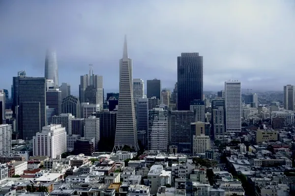 The downtown San Francisco skyline under low cloud